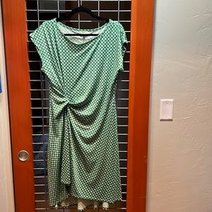 Women’s Short Sleeve Kelly Green main color, knot on side, very flattering.